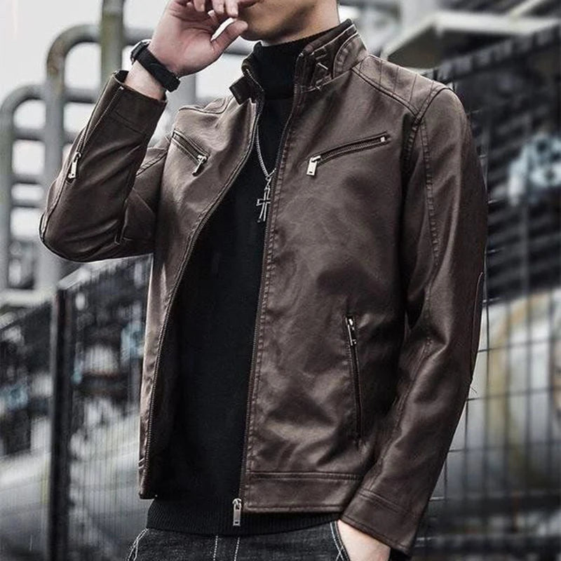 Men's black faux leather biker jacket by Jelieora Venture featuring a classic style with zip details and a fitted silhouette.