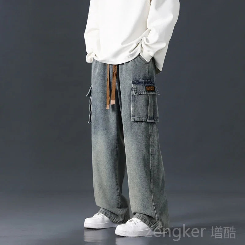 Men's plus size loose wide-leg jeans by Jelieora Venture with elasticated waist, showing relaxed fit and casual style.