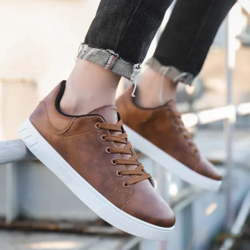 Men's leather loafer shoes by Jelieora Venture featuring classic design and brown leather material.