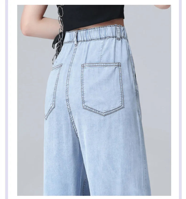 Women's high waist wide leg jeans by Jelieora Venture, showcasing the relaxed fit and stylish silhouette in a neutral color.