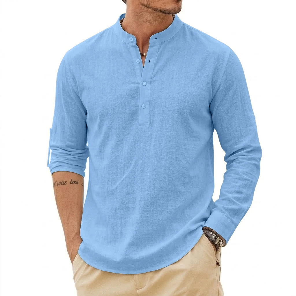 Men's linen Henley shirt by Jelieora Venture featuring a relaxed fit and button neckline, displayed on a neutral background.