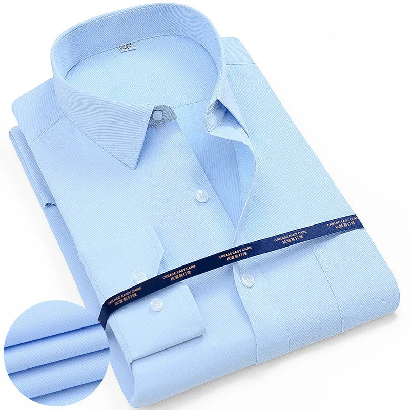 Men's plus size dress shirt by Jelieora Venture, navy blue with button-down collar and long sleeves, hanging on a hanger.