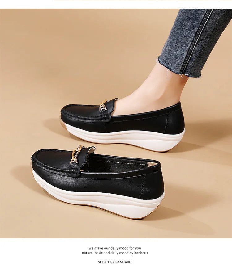 Women's suede mule clogs with cork soles from Jelieora Venture, showcasing stylish slip-on footwear with a comfortable design.