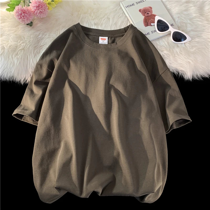 Men's solid basic hip hop cotton T-shirt by Jelieora Venture in black, displayed flat with short sleeves and crew neck.
