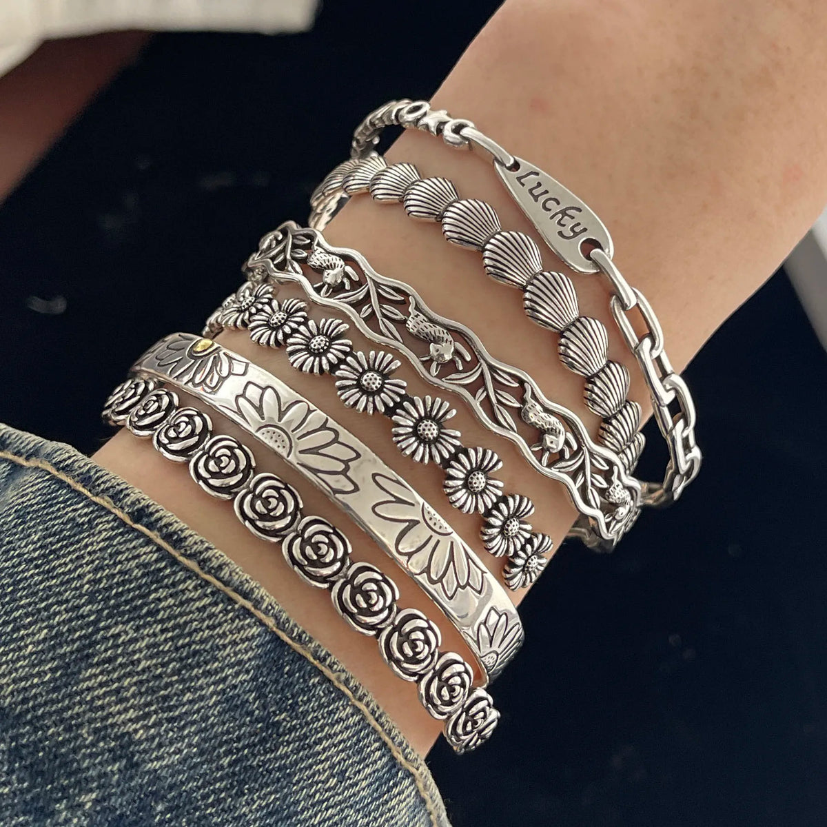 Sterling silver retro bracelet with vintage flower pattern, handmade jewelry for women and men by Jelieora Venture.