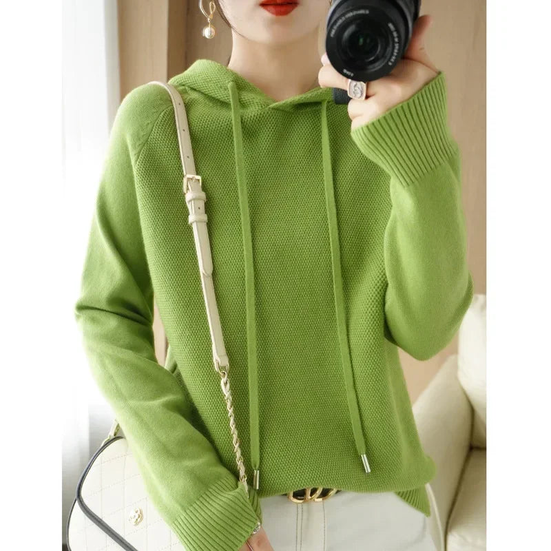 Women’s knitted hoodie jumper by Jelieora Venture featuring a cozy, textured knit fabric and a relaxed fit.