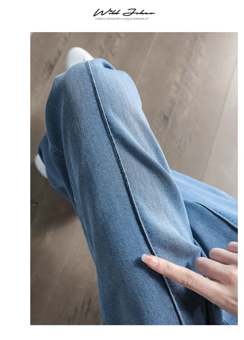 Women's high waist wide leg jeans by Jelieora Venture, featuring a relaxed fit and classic denim style.