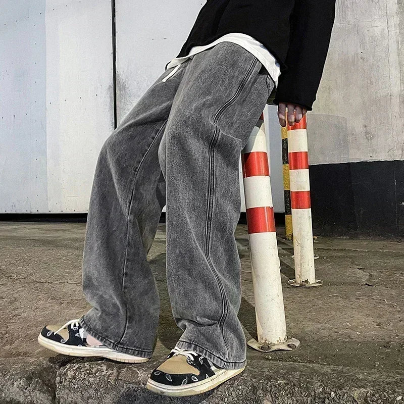 Men's wide leg streetwear jeans by Jelieora Venture, showcasing durable denim fabric and relaxed fit style.