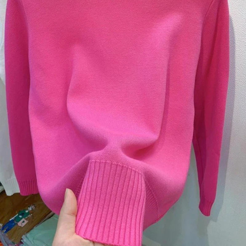 Women's turtleneck knit pullover sweater by Jelieora Venture, featuring a cozy, fitted design in soft, warm fabric.