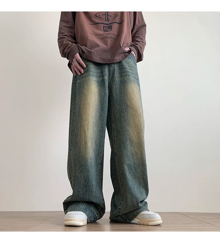 Men's distressed wide leg baggy jeans by Jelieora Venture, featuring a relaxed fit with ripped detailing and casual style.