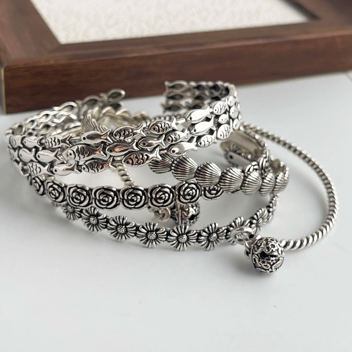 Sterling silver retro bracelet with vintage flower pattern, handmade jewelry for women and men, ideal birthday gift from Jelieora Venture.