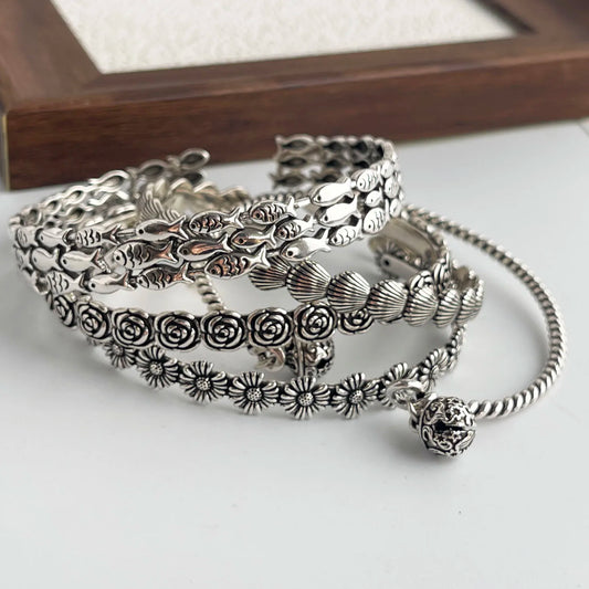 Sterling silver retro bracelet with vintage flower pattern, handmade jewelry for women and men, ideal birthday gift from Jelieora Venture.