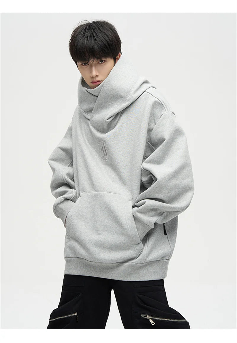 Men's black turtleneck hoodie by Jelieora Venture featuring a comfortable fit and casual style, shown on a model.